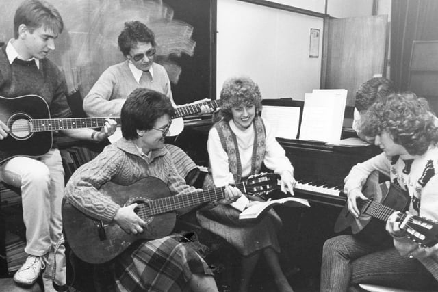 Music teacher Valerie Green with some of the students in her guitar class in 1986. Remember this