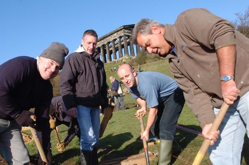 HSBC staff were among more than 60 volunteers who helped to repair the pathways and fences around Penshaw Monument in November 2005.