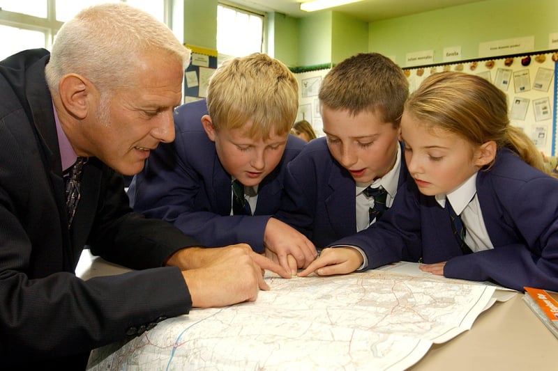 MP Gordon Marsden visits Highfield High School in Blackpool for the launch of their free maps for 11- year-olds as part of an initiative by the Ordnance Survey. L-R are MP Gordon Marsden with pupils Sam Jackson, Adam Constantine and Vicky Martin