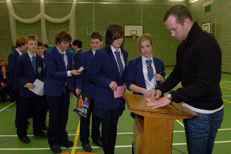 Blackpool FC captain Charlie Adam was at Hodgson High School this afternoon to officially open  their new sports hall.
Pupils line up for an autograph