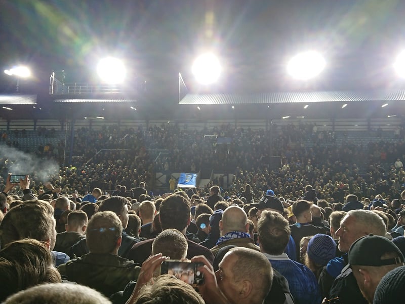 16 April 2024: A pitch invasion takes place after Pompey secure promotion