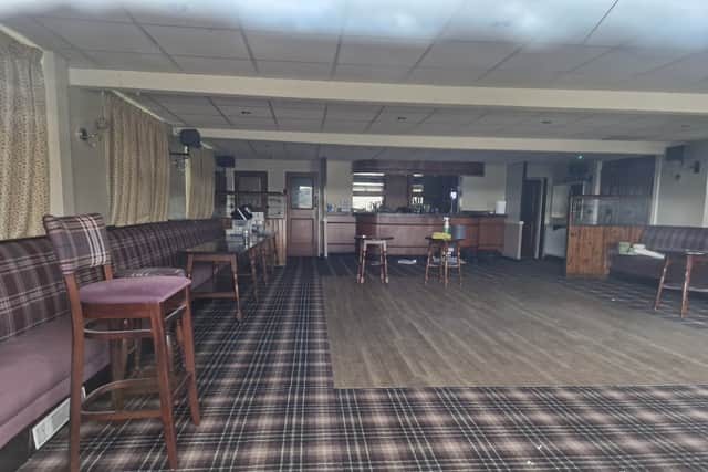 A view of the empty and locked Highcliffe Club through a window. Members voted to close the club in March, and if it is sold anyone who has been a member for over seven year will receive an equal cut of the money.