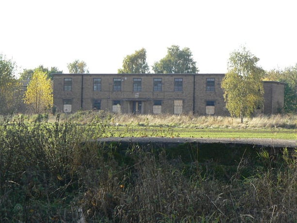 One of the many derelict buildings on the site prior to its demolition 