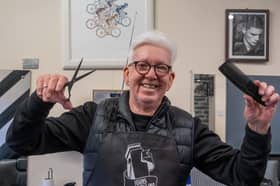 John Milton is celebrating 50 years running his John's Hairstyling's barber shop in Woodhouse, Sheffield. Picture: Dean Atkins, National World