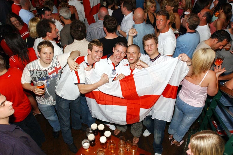 These fans were happy to pose for a photo during the half time break of England's Euro 2004 match with France.
Here they are in Varsity.