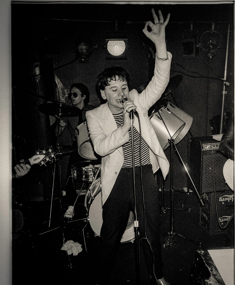 Early gigs at Mars Bar in 1979. Jim Kerr recalls his first press interview: "“The journalist guy said to me, what do you want out of all this? I was only 19. I said we want three things. We want to be a great live band, we want to take it around the world and we want to make a life out of it." Photo by Laurie Evans. 
