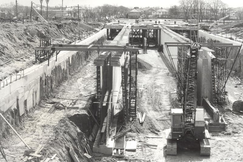 The airport tunnel which would allow traffic to pass under the runway extension takes shape alongside the Bradford to Harrogate Road. Pictured in April 1983.