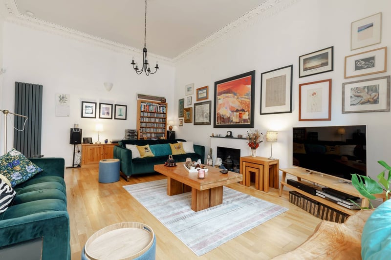 On the first floor, there is an impressive bay windowed sitting room which has high ceilings, intricate cornicing, gas fire with surround and working shutters. 