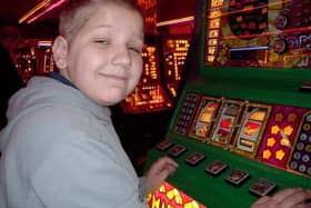 Kieren Smith playing seaside slot machines as a child in Mabelthorpe.