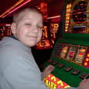 Kieren Smith playing seaside slot machines as a child in Mabelthorpe.