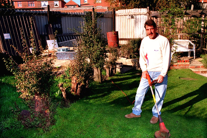 This is Osmondthorpe's Howard Deanwho was in dispute with Leeds City Council over a piece of land to left of tree stumps in his garden. He is pictured in October 1997.