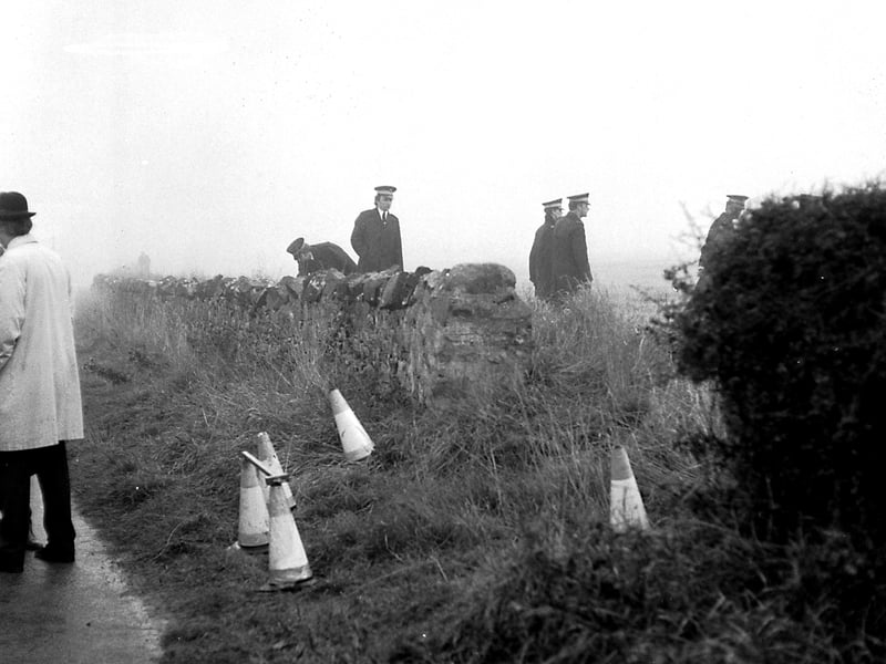 Police investigating the World's End murders of Christine Eadie and Helen Scott at the spot near Haddington where Helen's body was found in October 1977.