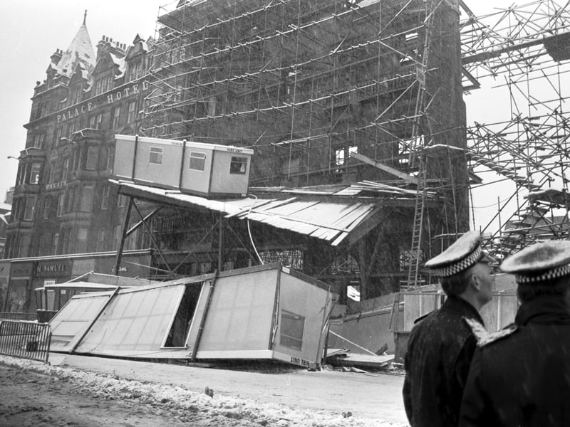 Police on the scene of a scaffolding collapse in Princes Street Edinburgh in March 1979. Workmen's huts were crushed or fell onto the street.
