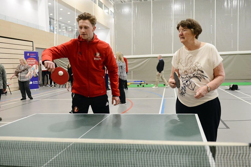 Sunderland AFC defender Denver Hume enjoyed a game of table tennis with Jenny Plunkett during the EFL Day of Action held at the Beacon of Light in 2020.