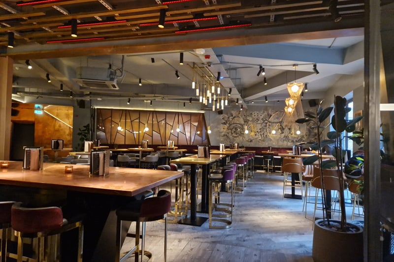 The Alchemist décor has modern aesthetics and alchemical flair. The dimly lit space exuded an air of sophistication, with plush velvet seating and metallic accents. 