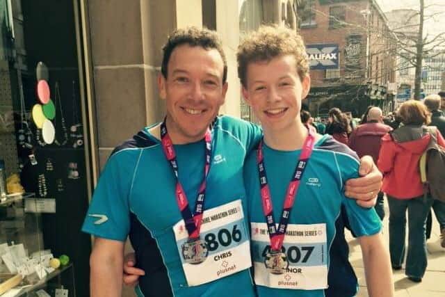 Connor (right) with his dad Chris at the Yorkshire marathon when he was younger.