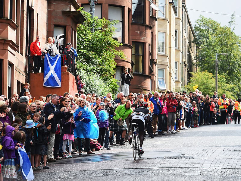 Sebastian Kigongo Semakula of Uganda is cheered on by spectators in the Men's Road Race during day eleven of the Glasgow 2014 Commonwealth Games on August 3, 2014.