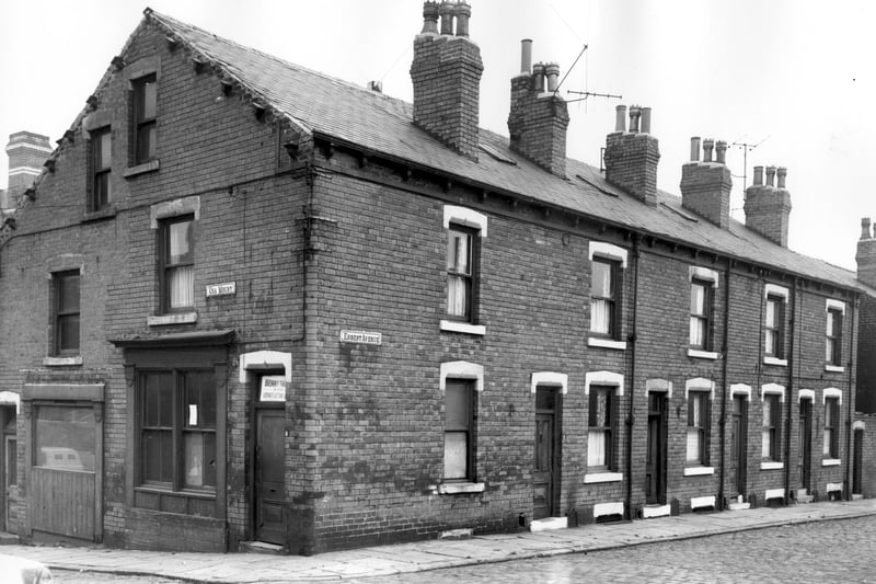 The junction of Ernest Avenue and Una Mount in October 1963. Number 6 on the corner is a betting shop. On the right is a row of back-to-back terraced houses with a yard on the right built to house the outside toilet. On the lower wall of each house is a cast iron covered cellar grate once used to deliver coal to the coal cellar.