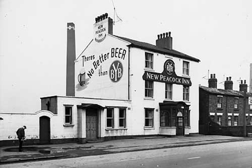 New Peacock Inn, adjacent to Elland Road in November 1963. This pub was demolished to provide part of the route for junction 2 of the M621, roundabout and Stadium Way. The 'New' Peacock closed in 1974, the landlord and landlady at the time were Sammy and Betty Redmond. 