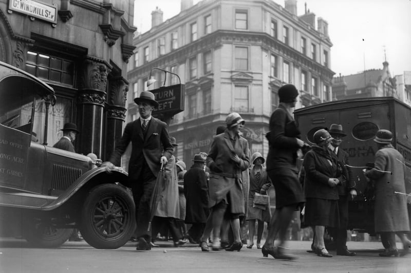 1930:  Pedestrians crossing Great Windmill Street, Soho, London.  (Photo by General Photographic Agency/Getty Images)