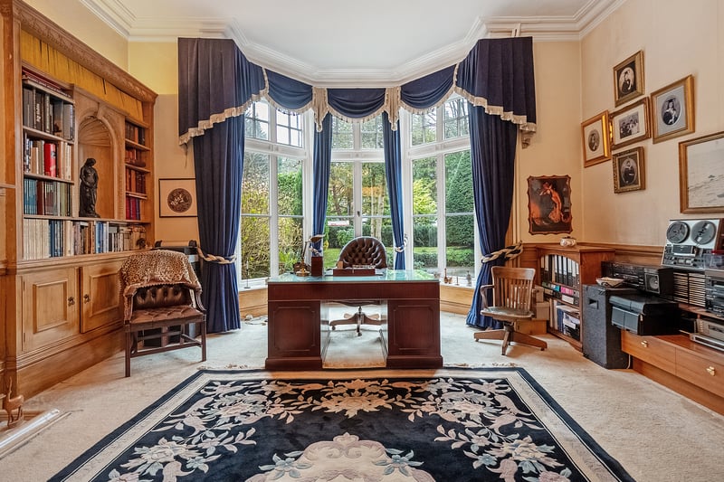 The property even has its own office and library room with stunning views out into the garden