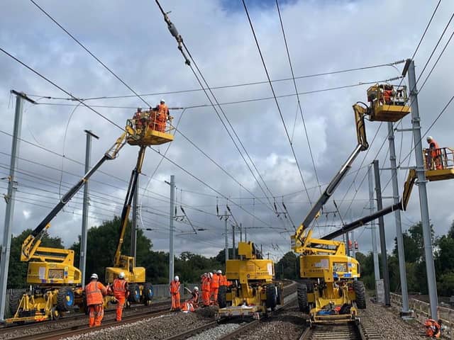 Engineers installing overhead lines as part of the Midland Mainline upgrade.
