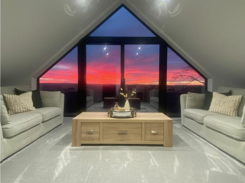 The modern design gives you stunning rooms like this one with tremendous views over the surrounding area.