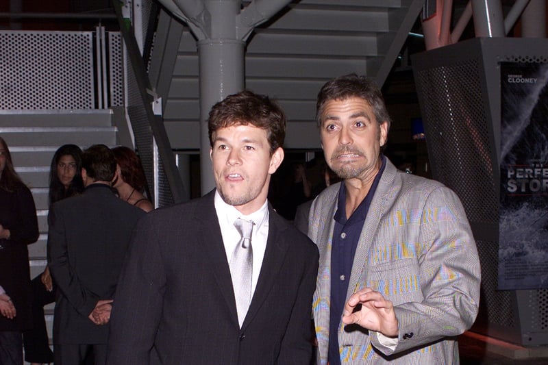 Mark Wahlberg and George Clooney attend the UK premiere of their new film "The Perfect Storm" in Birmingham,Ge on July 20, 2000.