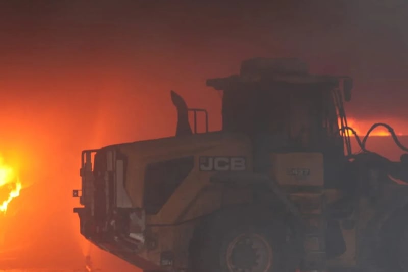 The flames came very close to a digger at the site