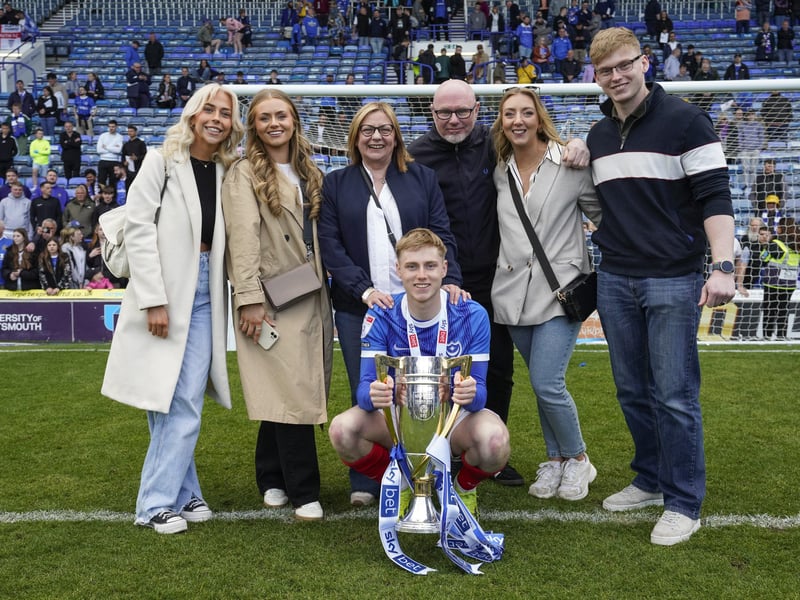 Paddy Lane and proud family in front of the Fratton End