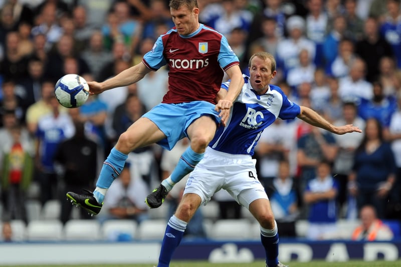 James Milner of Aston Villa battles for the ball with Lee Bowyer of Birmingham City  during the Barclays Premier League match between Birmingham City and Aston Villa at St. Andrews Stadium on September 13, 2009 in Birmingham, England