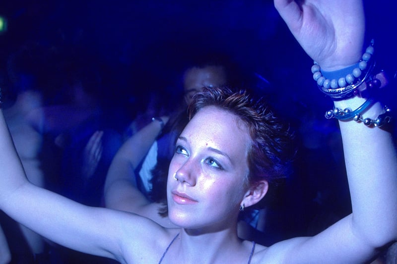 Girl dancing at Atomic Jam the Que Club Birmingham August 2000.
