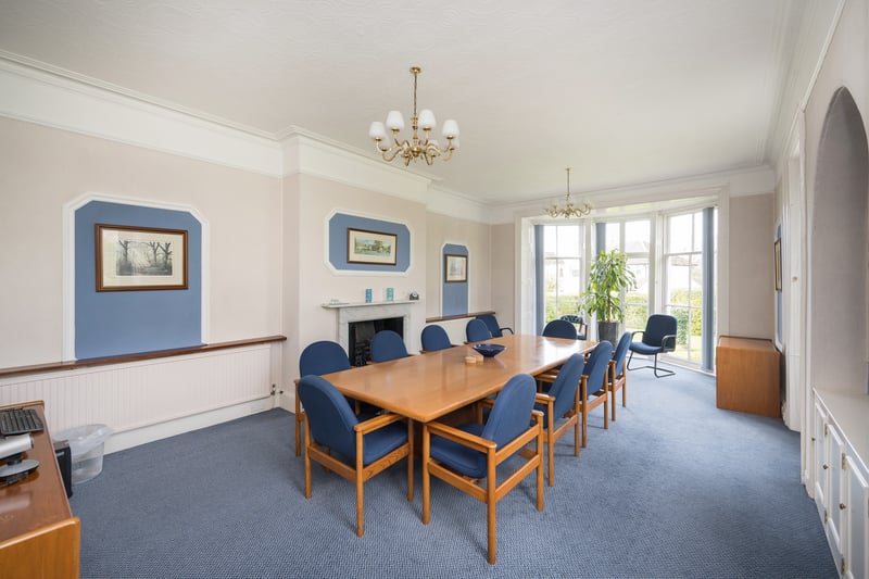 It features a panelled reception hall with the main staircase leading to rooms of similar sizes of the first floor.