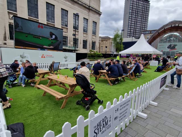 Deck chairs and a big screen outside the Crucible in Tudor Square were among the attractions bringing a buzz to Sheffield city centre at the start of the World Snooker Championship.