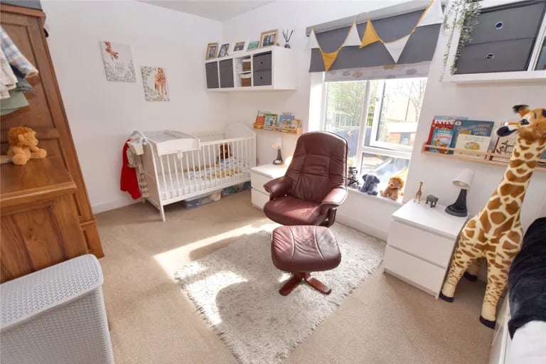 This versatile room is ideal for children or for use as a study.