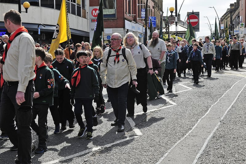 The procession sets off past Morley Town Hall.