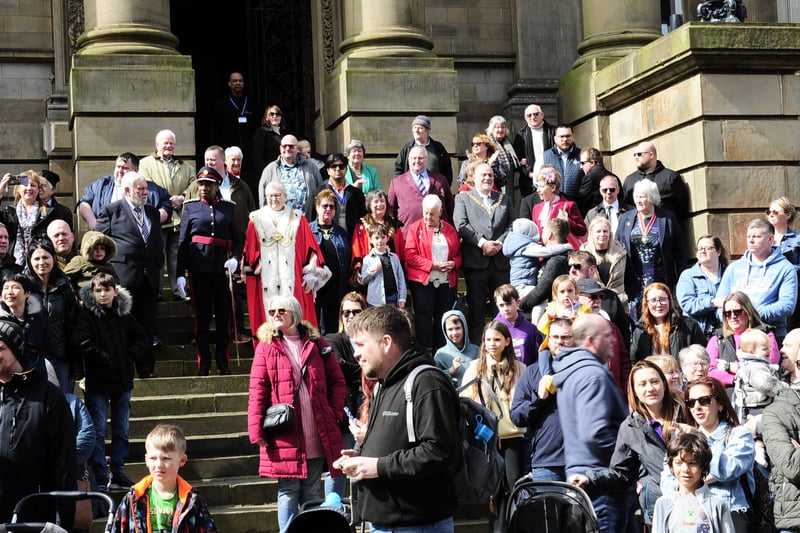 A good crowd at Morley Town Hall as the procession sets off.