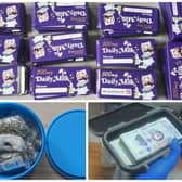 Police seize 'Daily Milk' cannabis-laced chocolate, cannabis in a Roses box and tin of cash in Doncaster raid.