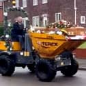 Dave Newton's funeral with his coffin in a dumper truck. 