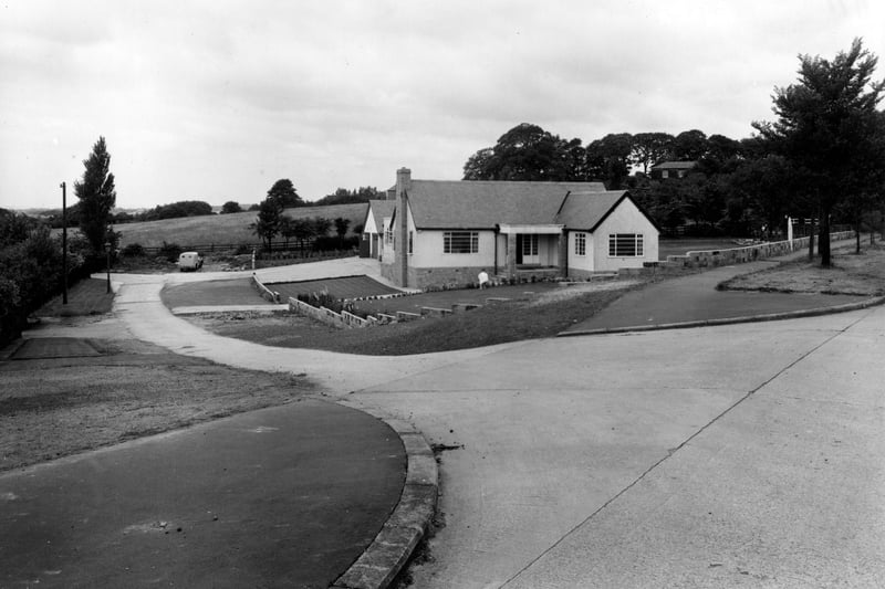 A view looking south west down The Fairway from Alwoodley Lane in July 1954.
