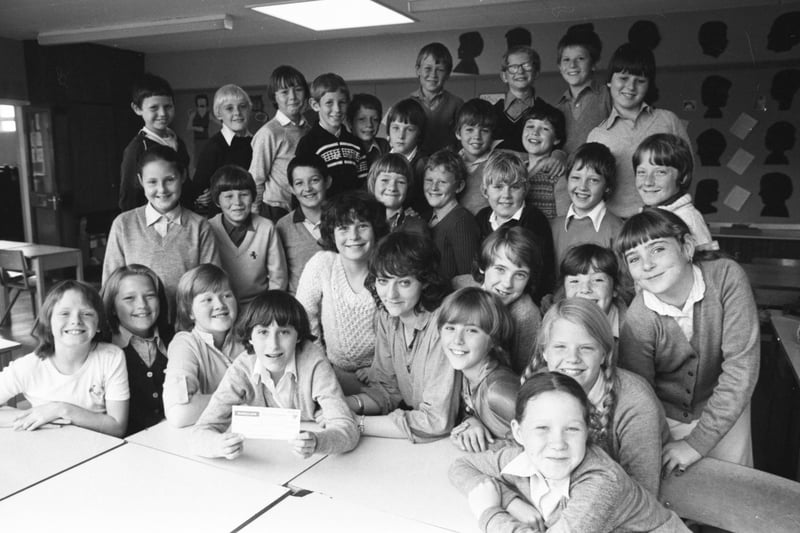 It all went swimmingly for Class J5 of Witherwack Junior School who did a sponsored swim and a sponsored walk for charity in August 1981.