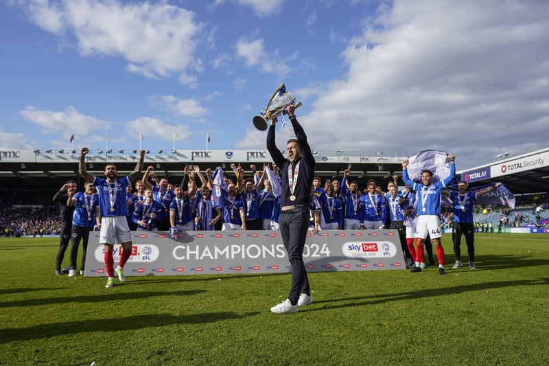 Pompey have been crowned champions and the boss lifts the trophy aloft as the players he's united roar their approval. Great to see.