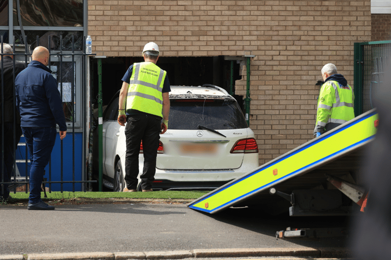 A car crashed through the classroom wall of an Everton primary school.