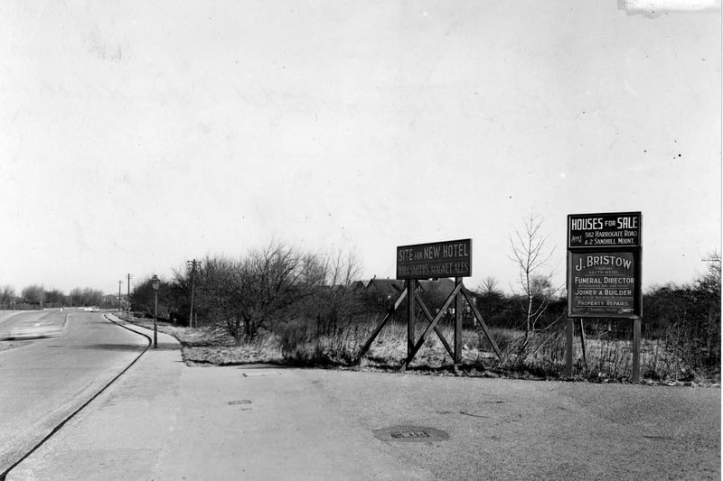 Looking north along Harrogate Road from the Sandhill Estate area in February 1952. Signs on wooden supports are for "Site for new hotel - John Smith's Magnet Ales", "Houses for sale" and "J. Bristow funeral director/joiner/property repairs".

