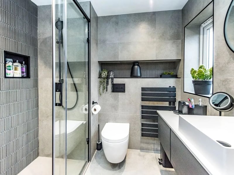 The en-suite has a stunning, modern finish.