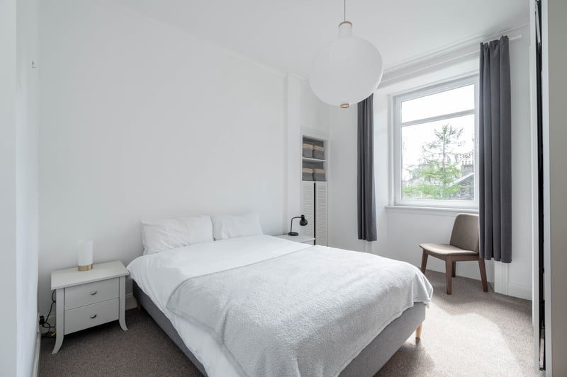 The property includes two good sized double bedrooms including this light and airy principal bedroom.