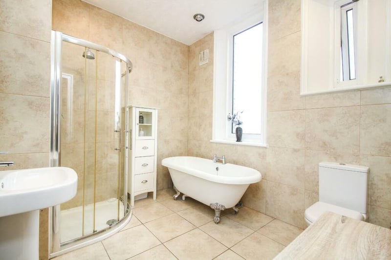 The property features two bathrooms, including a main family bathroom and an ensuite in one of the bedrooms.
