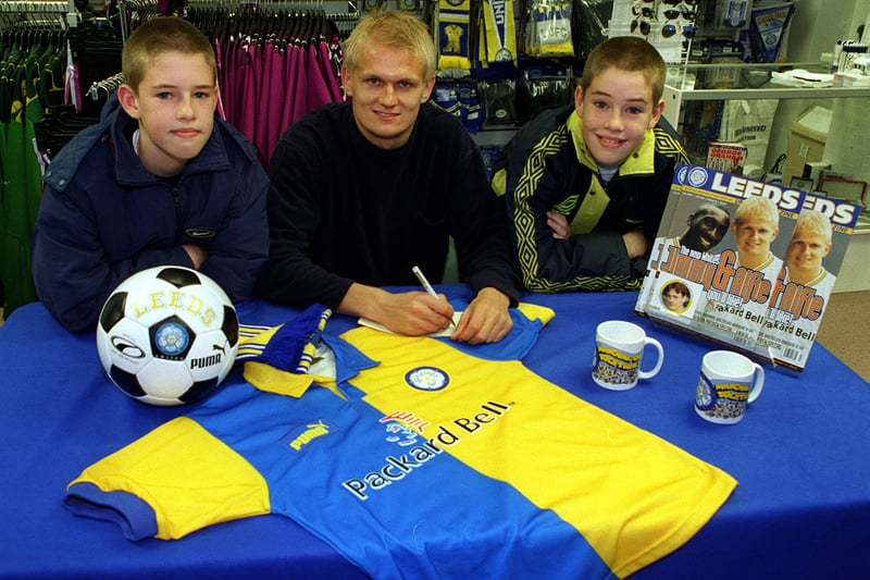 Inside the New Leeds United Collection Shop at the airport in November 1997. Pictured are twins Alexander and Ashley Brancker who met Alfie Haaland who was signing autographs.
