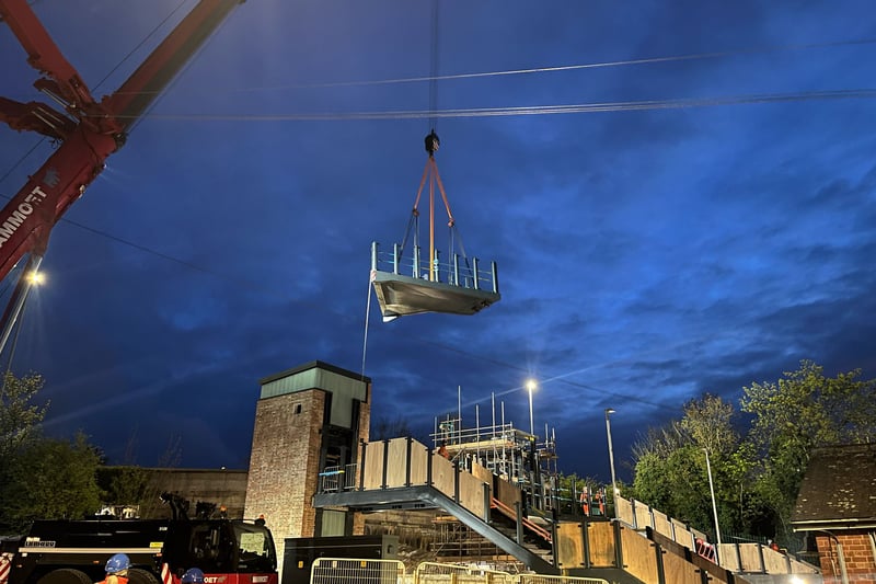 11 pictures as UK's first 'beacon bridge' is lifted into place at Leeds ...