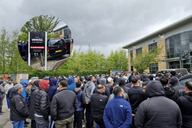 Veezu drivers gather outside the company's Sheffield offices. They were protesting against the "staggering" cut the app is taking from taxi fares.